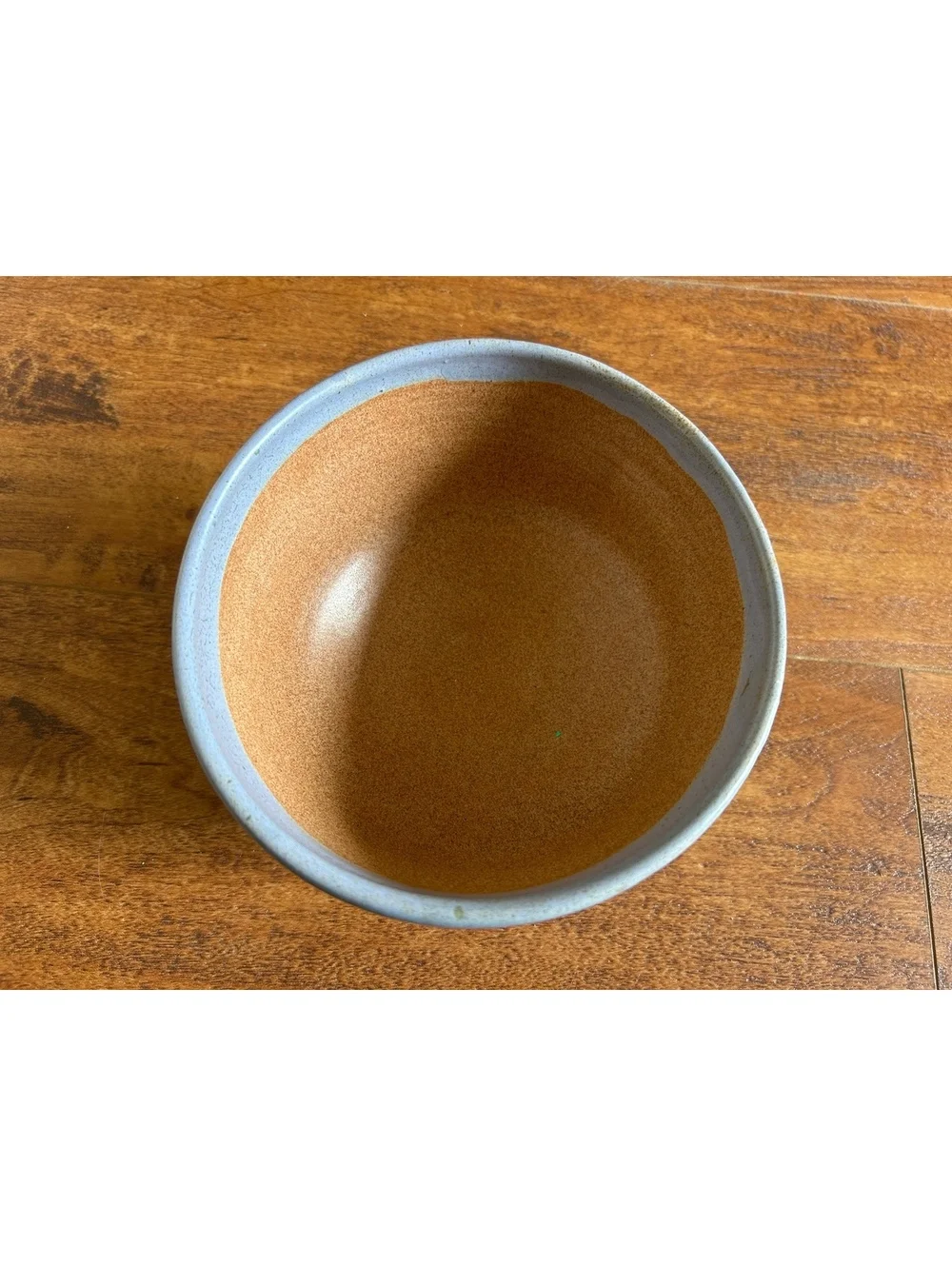 Handmade Ceramic Bowl with Blue Exterior and Brown Interior